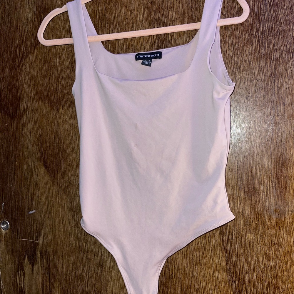 Light pink/purple bodysuit